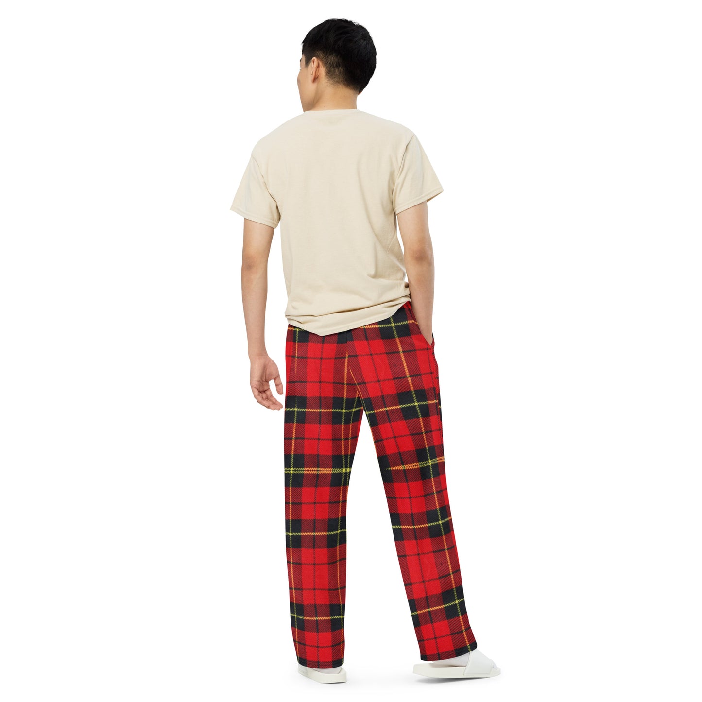 Back view of Man with hands in pocket wearing tartan plaid comfort pants