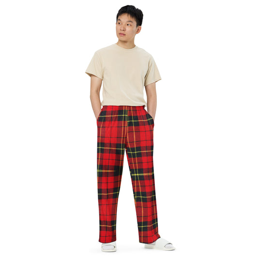 Man with hands in pocket wearing tartan plaid comfort pants