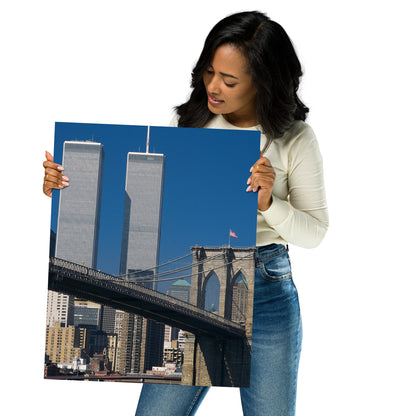 Woman holding a 16" x 24" poster of the World Trade Center Twin Towers and Brooklyn Bridge