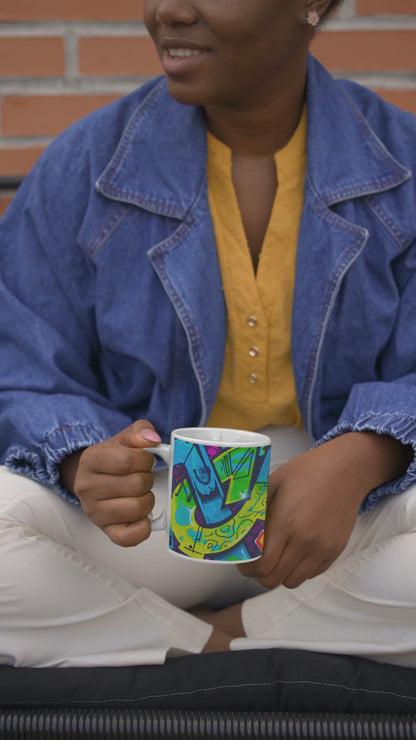 Video of woman holding a bright neon blue graffiti art coffee mug